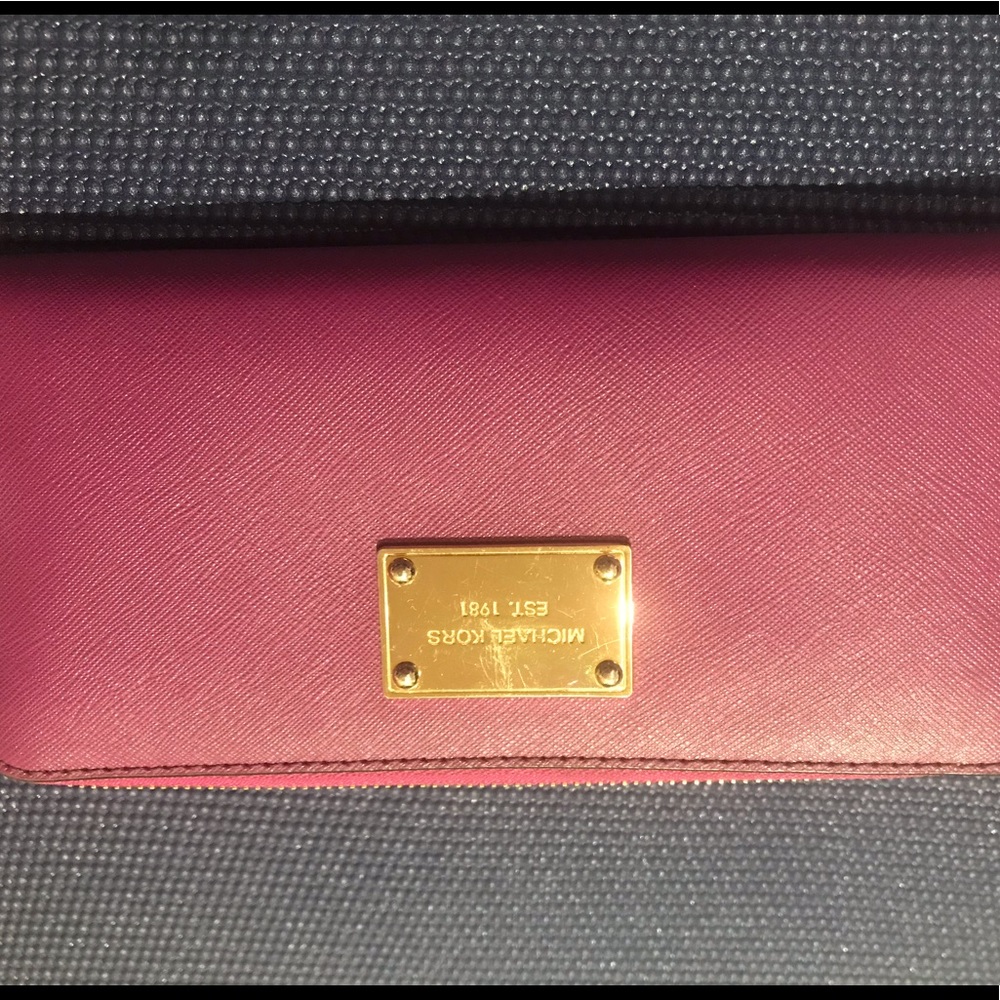 Michael Kors pink zip around wallet